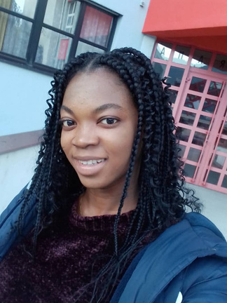 Portrait of Pretty Okoro, UI/UX and graphic designer
